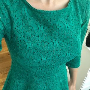 Anthropologie green peplum lace top size 0